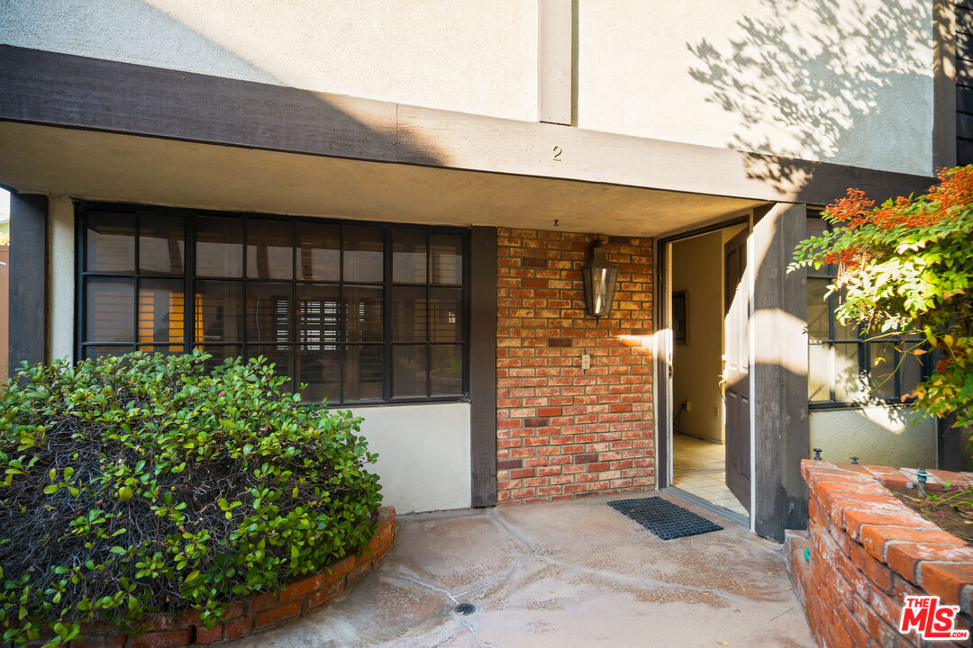 1445 Valley View Road, Unit 2 Glendale, CA 91202 - Photo 4 of 36 a front view of a house with a garage