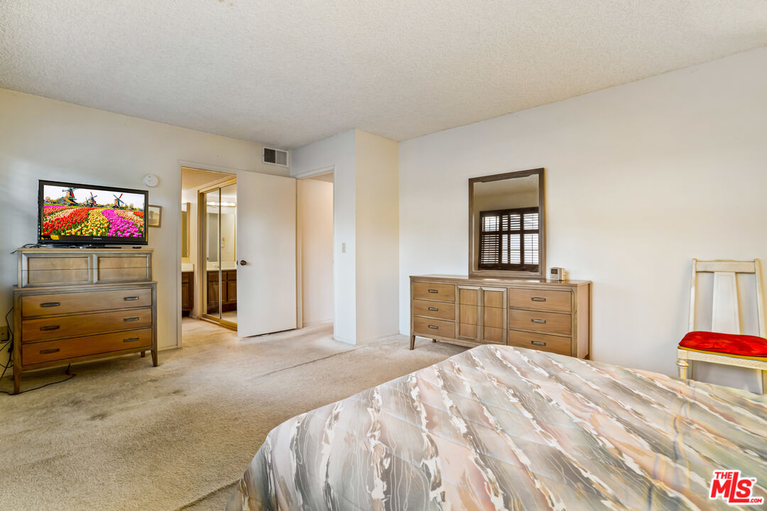 1445 Valley View Road, Unit 2 Glendale, CA 91202 - Photo 33 of 36 a bedroom with a bed and a television