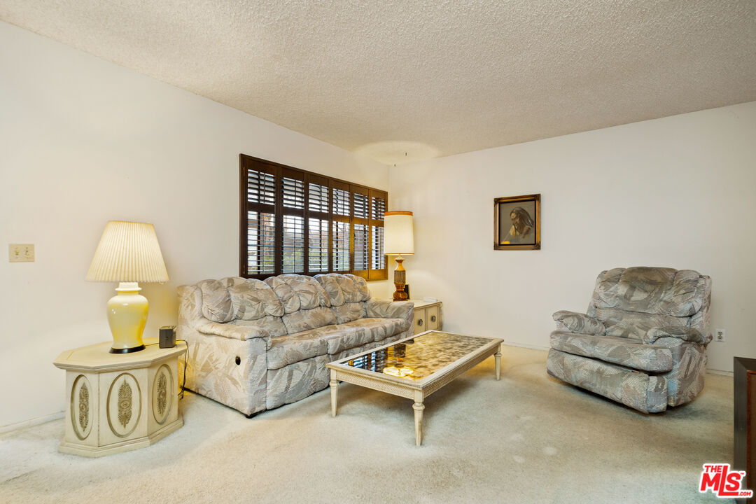 1445 Valley View Road, Unit 2 Glendale, CA 91202 - Photo 9 of 36 a living room with furniture and a couch