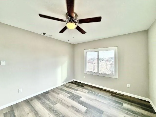 a view of an empty room and window
