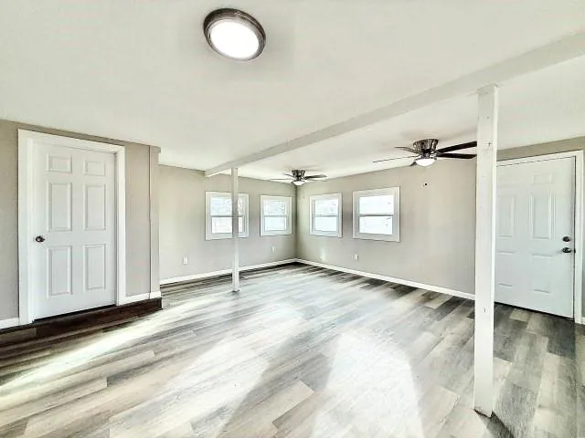 a view of an empty room and window