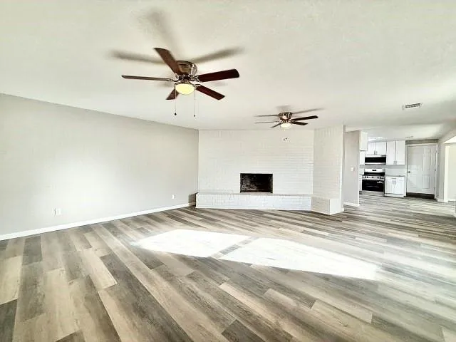 a view of a livingroom with a flat screen tv