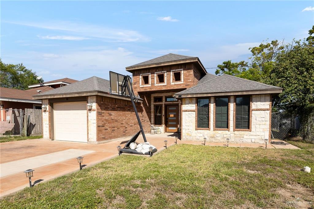 3609 Paseo Del Rey Edinburg, TX 78542 - Photo 20 of 20 a front view of a house with a yard