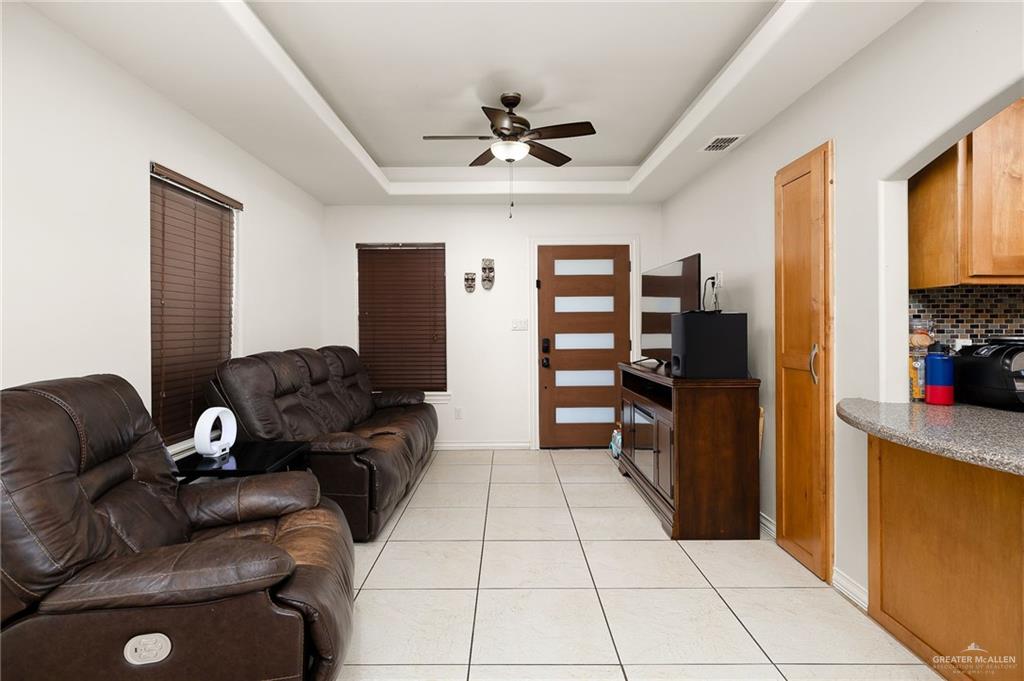3609 Paseo Del Rey Edinburg, TX 78542 - Photo 6 of 20 a living room with furniture and a flat screen tv
