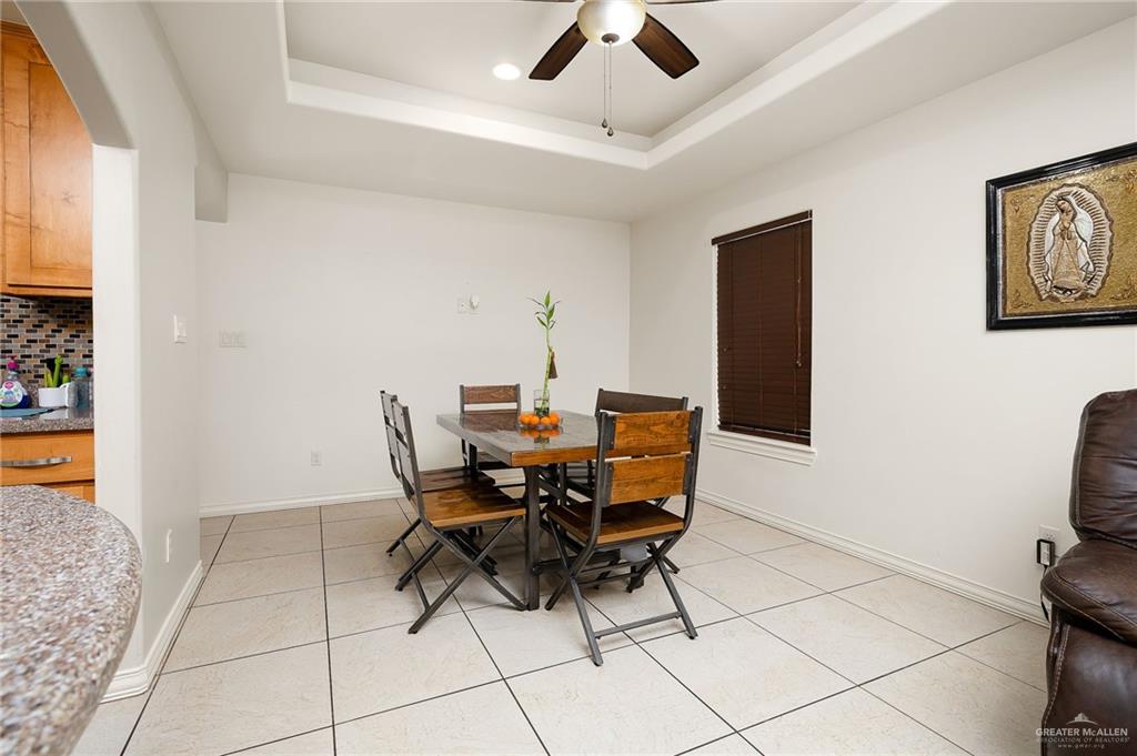 3609 Paseo Del Rey Edinburg, TX 78542 - Photo 7 of 20 a view of a workspace with furniture and a window