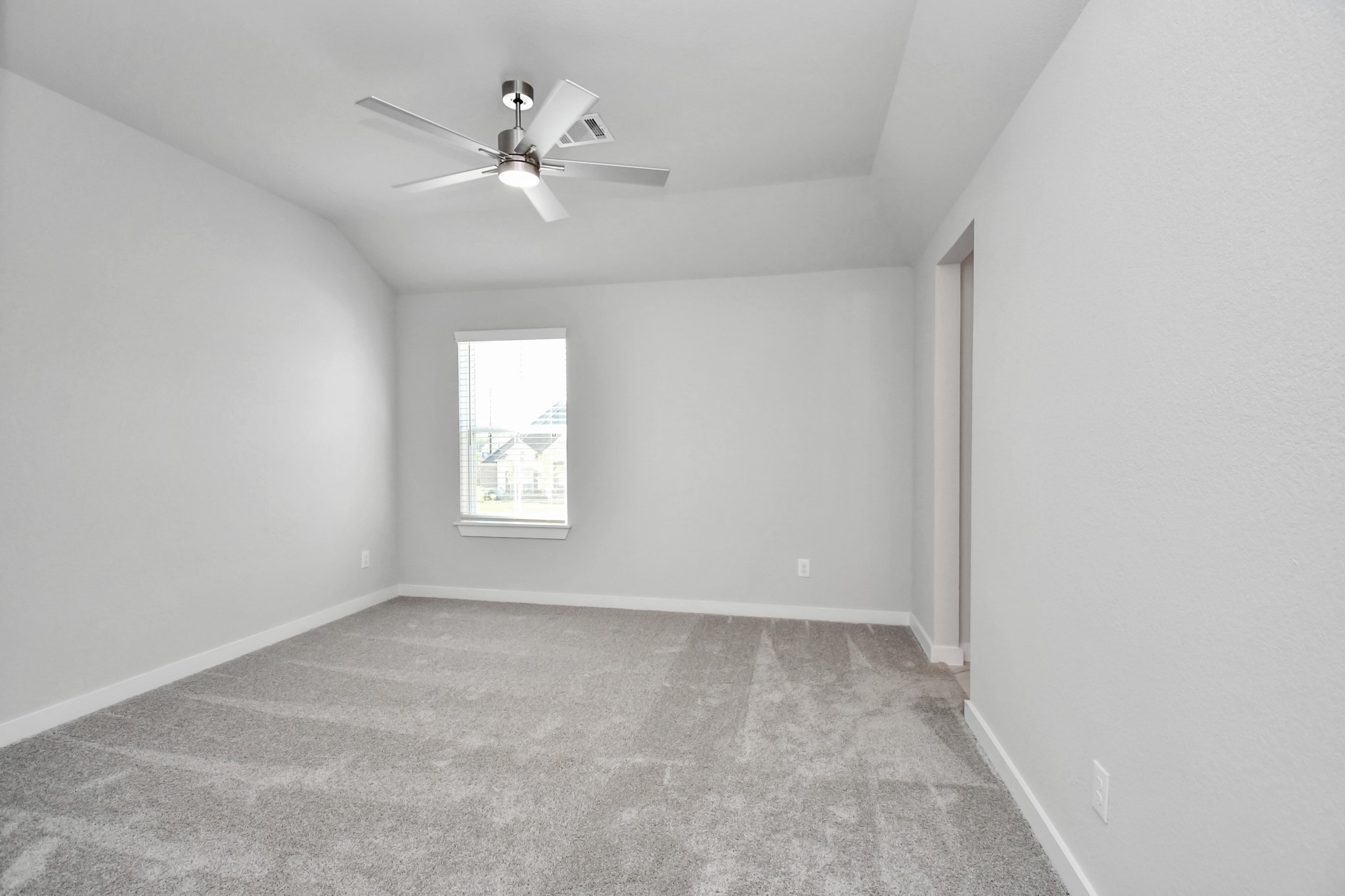 3019 Knotty Frst Drive Spring, TX 77373 - Photo 29 of 47 Secondary bedroom features plush carpeting, large windows that let in plenty of natural light, bright paint, and spacious closets.