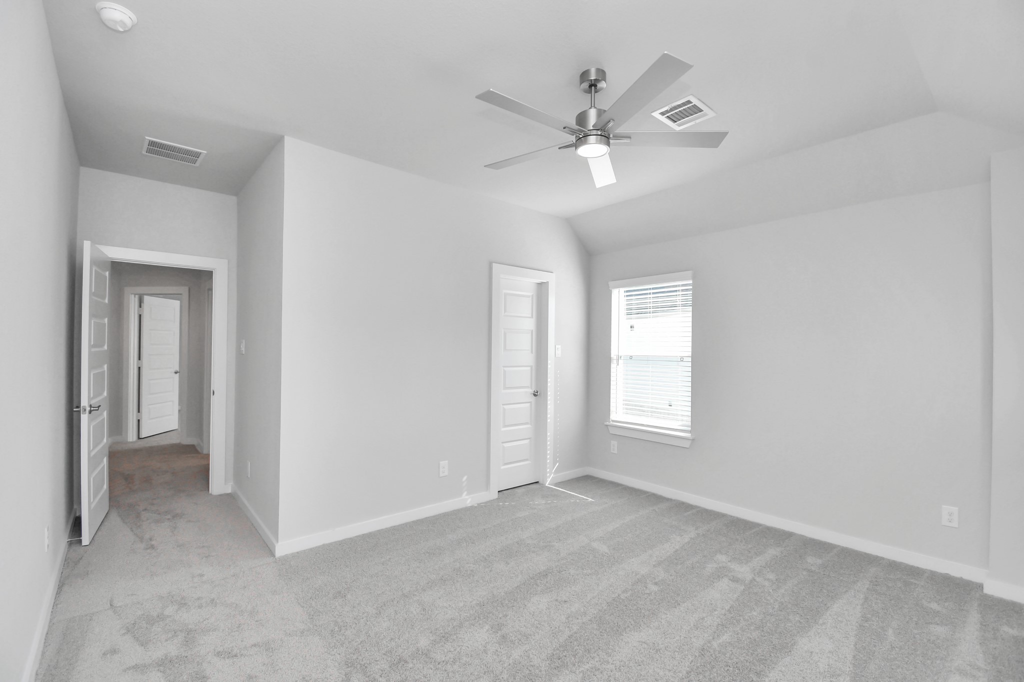 3019 Knotty Frst Drive Spring, TX 77373 - Photo 38 of 47 Generously sized secondary bedrooms featuring spacious closets, soft and inviting carpeting underfoot, large windows allowing plenty of natural light, and the added touch of privacy blinds for your personal retreat.