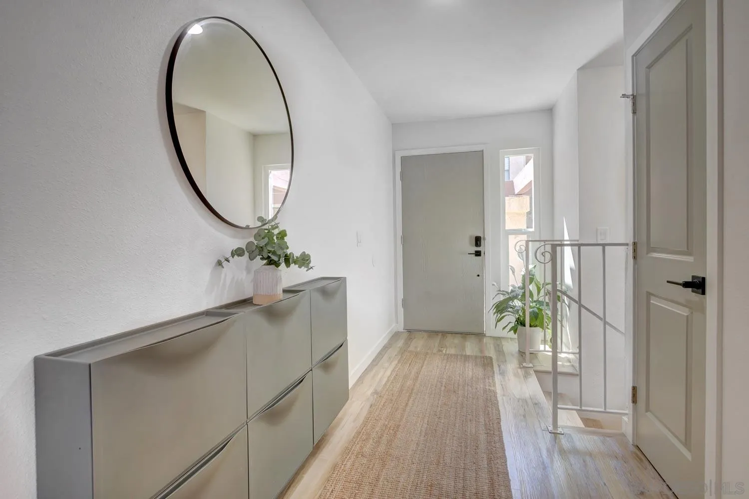 10784 Tamar Terrace, Unit C Santee, CA 92071 - Photo 16 of 33 a view of a livingroom with furniture and wooden floor