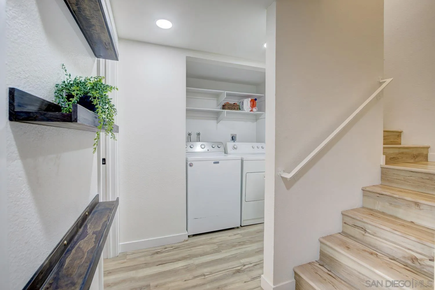 10784 Tamar Terrace, Unit C Santee, CA 92071 - Photo 17 of 33 a view of a hallway with wooden floor and entryway