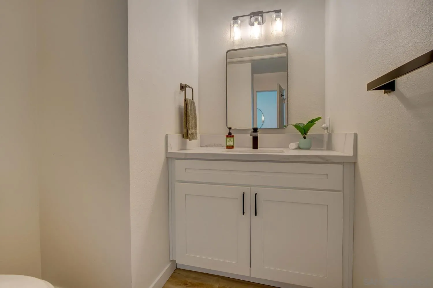 10784 Tamar Terrace, Unit C Santee, CA 92071 - Photo 27 of 33 a bathroom with a sink and a mirror