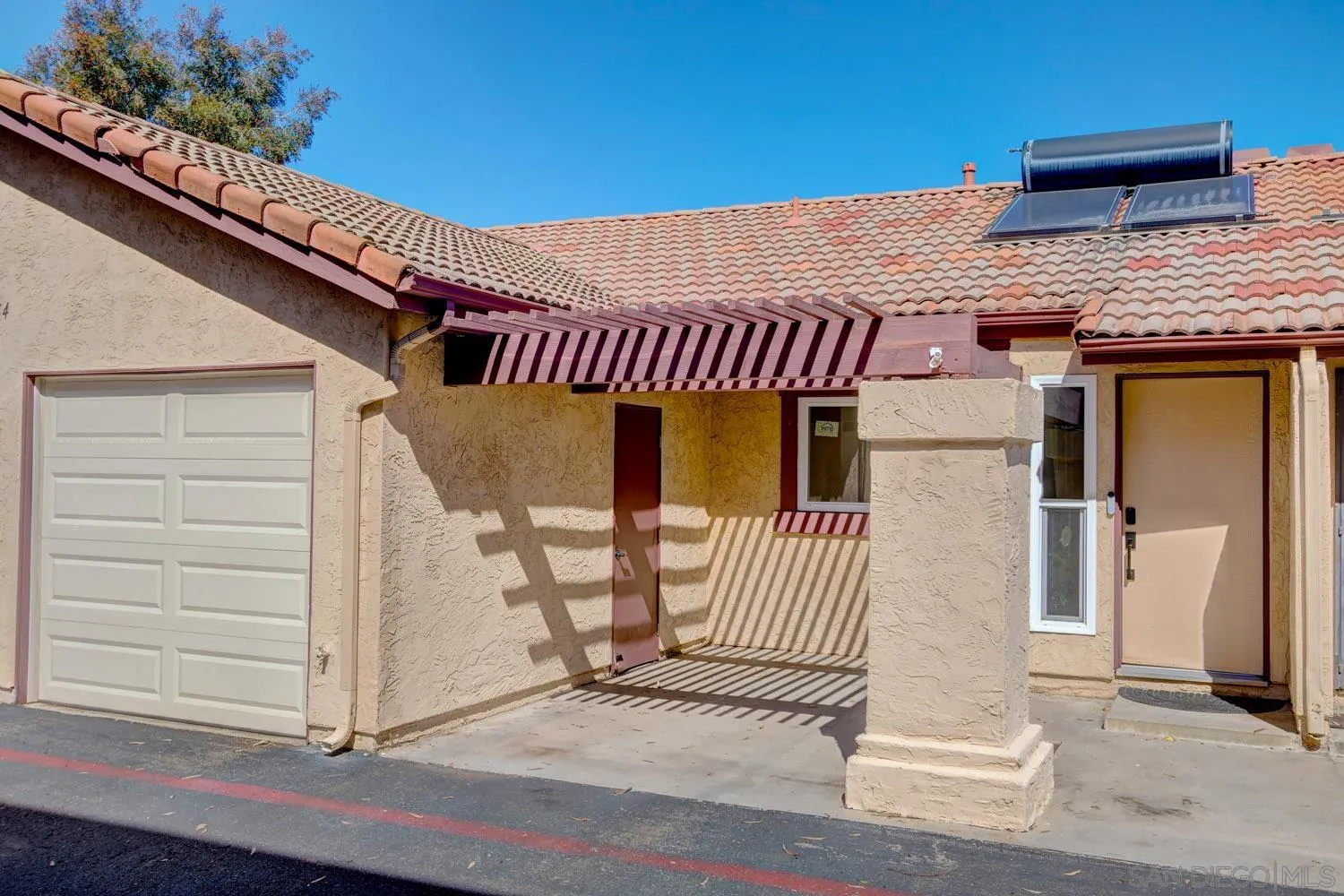 10784 Tamar Terrace, Unit C Santee, CA 92071 - Photo 31 of 33 a view of a house with a porch