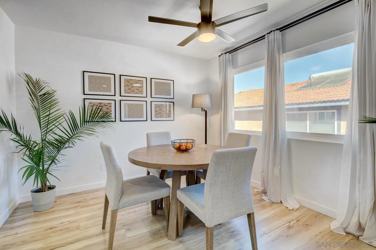 10784 Tamar Terrace, Unit C Santee, CA 92071 - Photo 4 of 33 a view of a livingroom with furniture and window