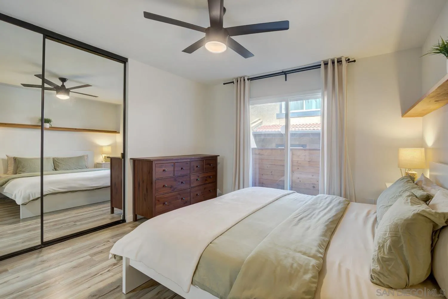 10784 Tamar Terrace, Unit C Santee, CA 92071 - Photo 7 of 33 a bedroom with a bed and a closet