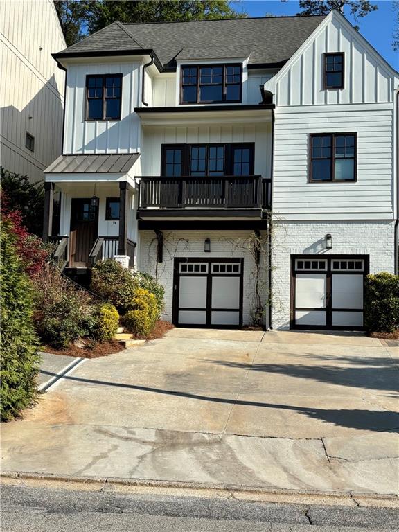a front view of a house with yard