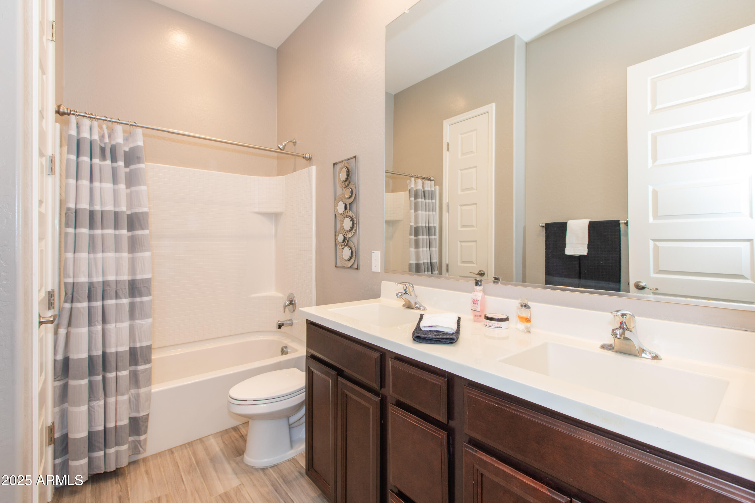 20084 Rosa Road Queen Creek, AZ 85142 - Photo 34 of 53 a bathroom with a sink double vanity toilet and shower