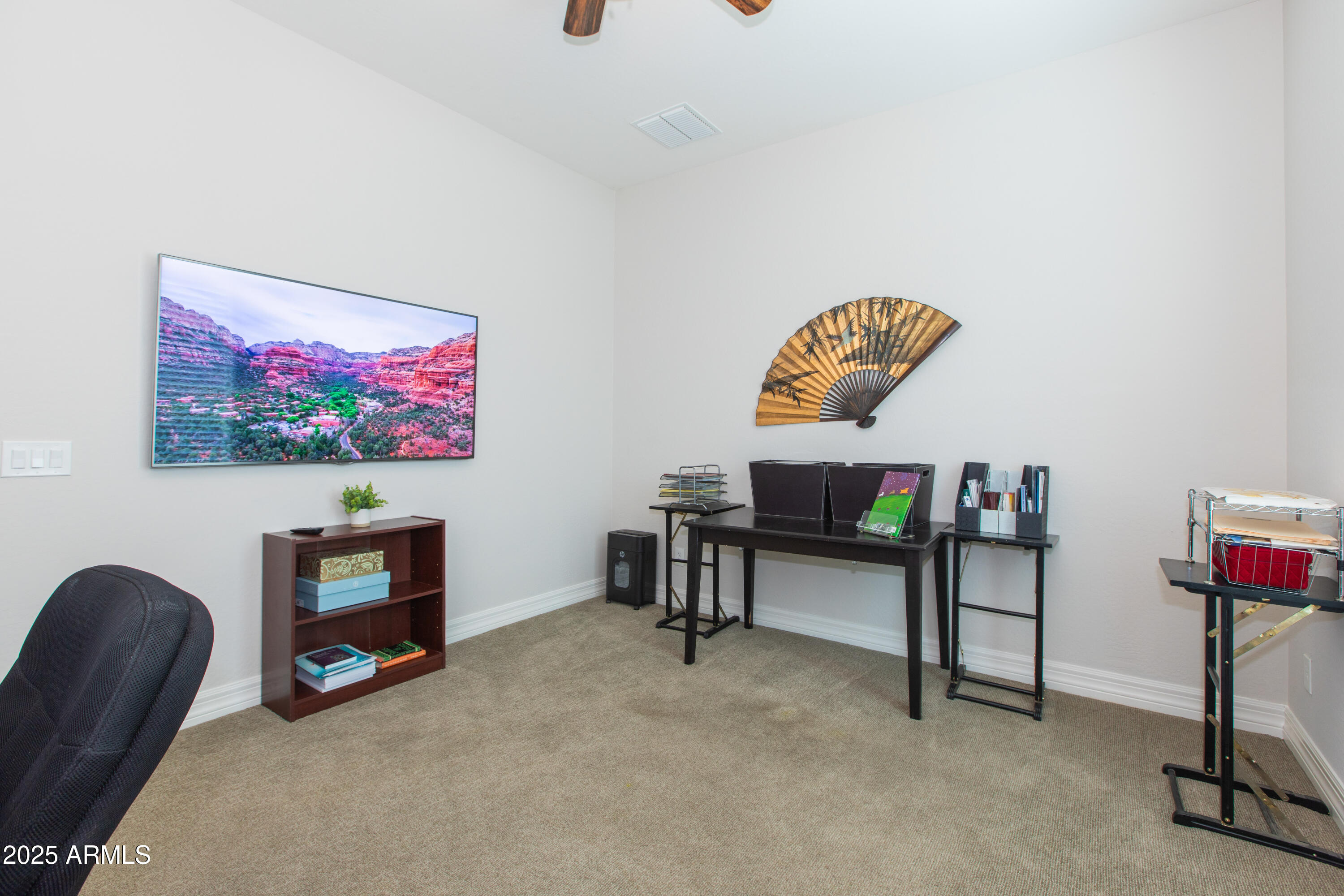 20084 Rosa Road Queen Creek, AZ 85142 - Photo 36 of 53 a living room with furniture and a chair