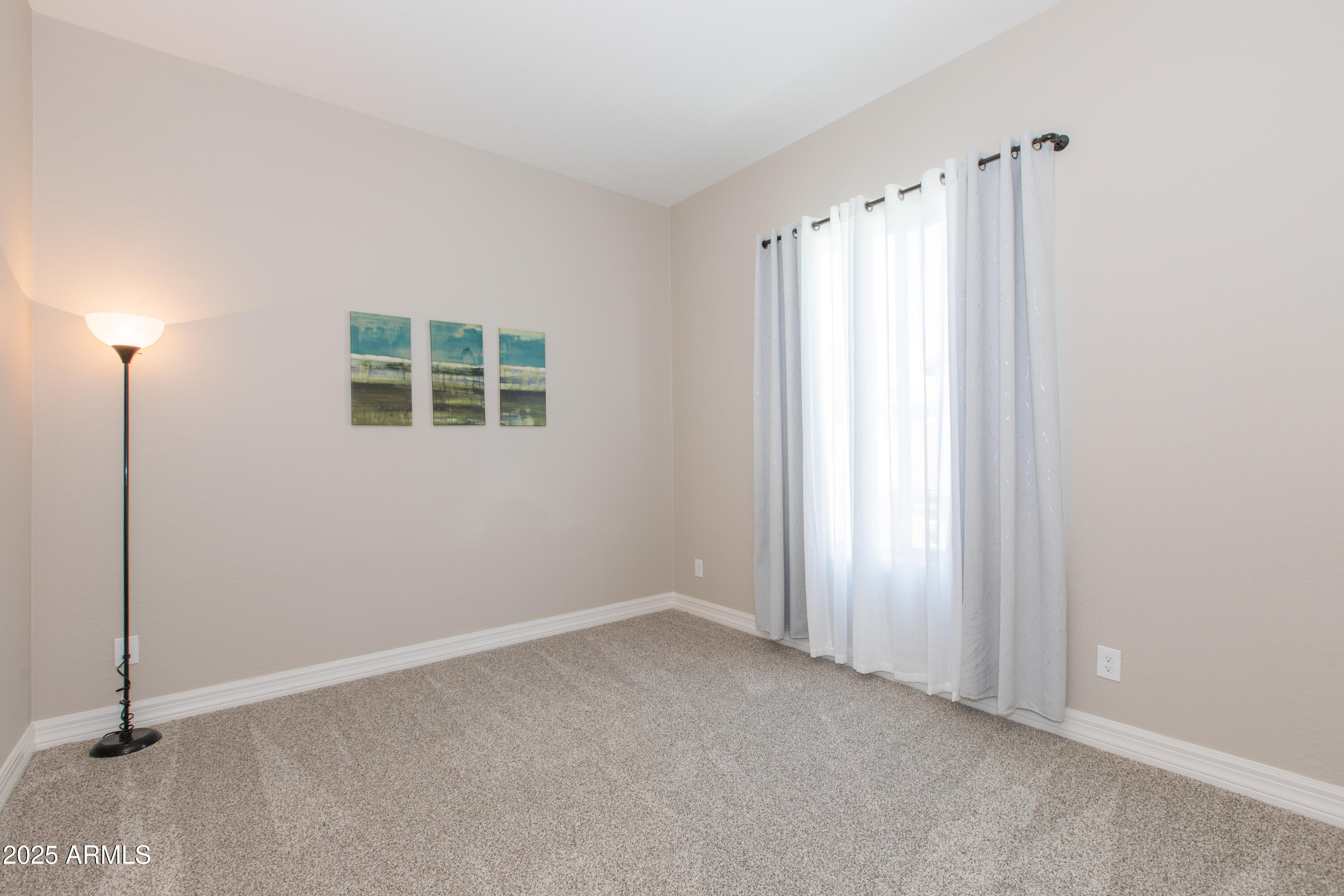 20084 Rosa Road Queen Creek, AZ 85142 - Photo 37 of 53 a view of an empty room with a window