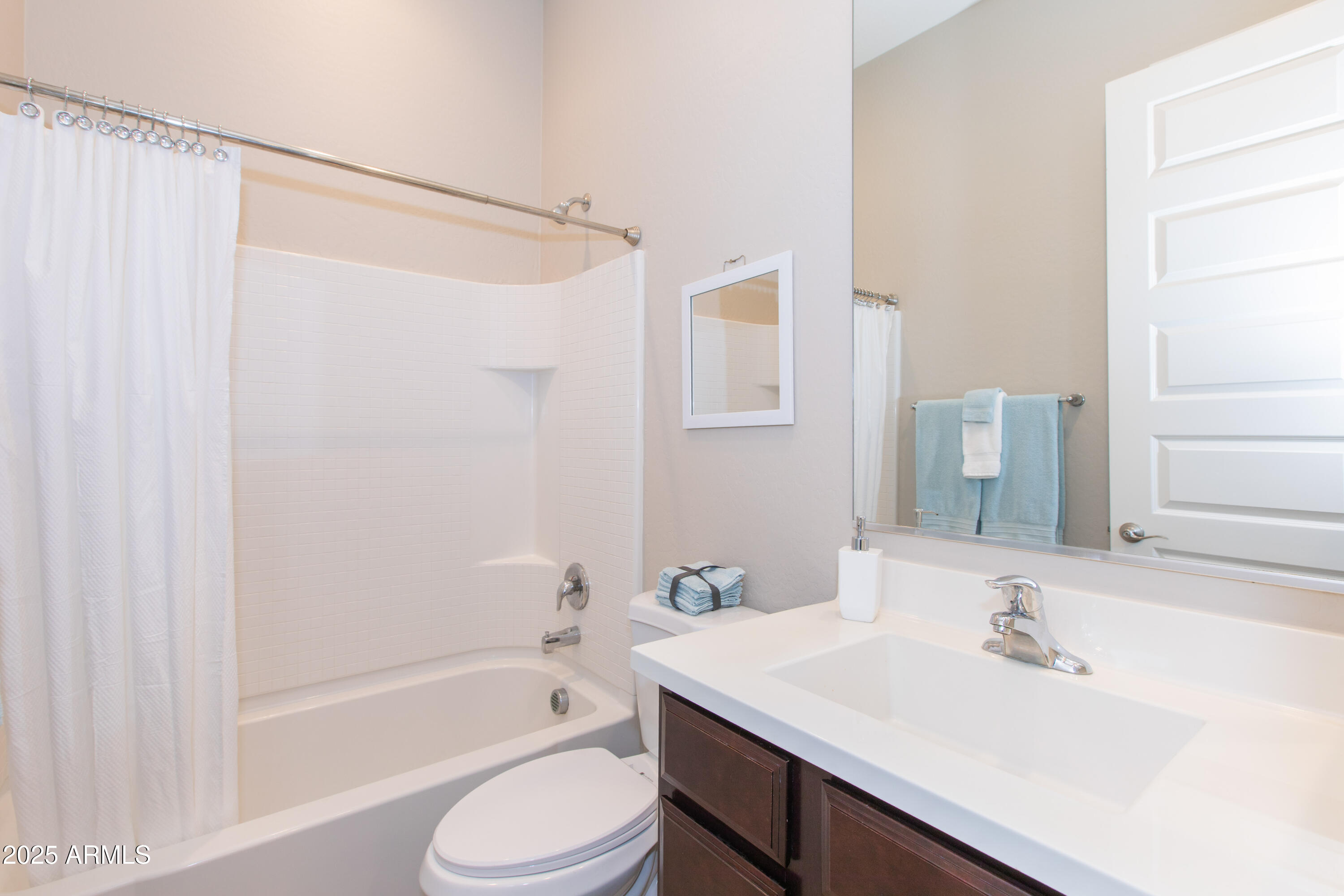 20084 Rosa Road Queen Creek, AZ 85142 - Photo 39 of 53 a bathroom with a sink a toilet and shower