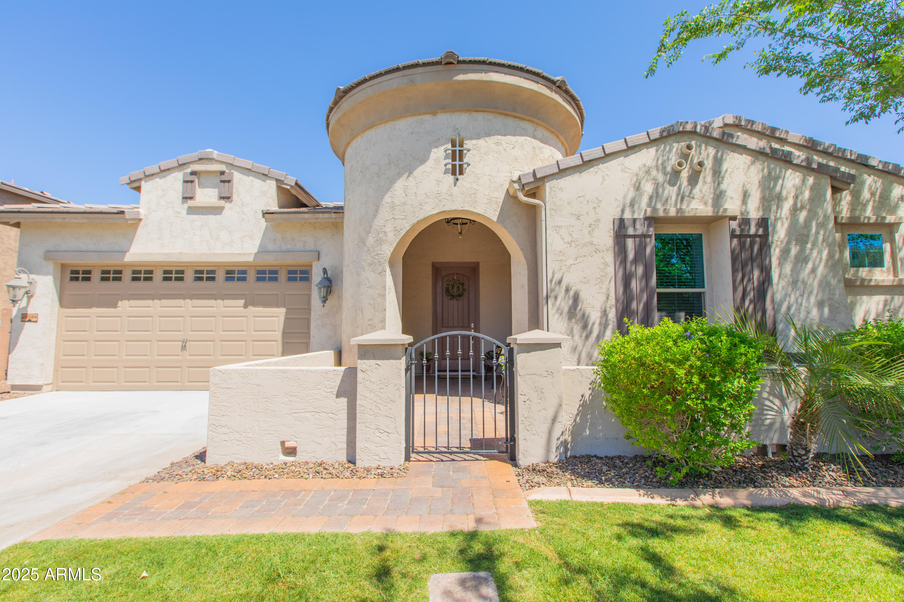 20084 Rosa Road Queen Creek, AZ 85142 - Photo 4 of 53 a front view of a house with a yard