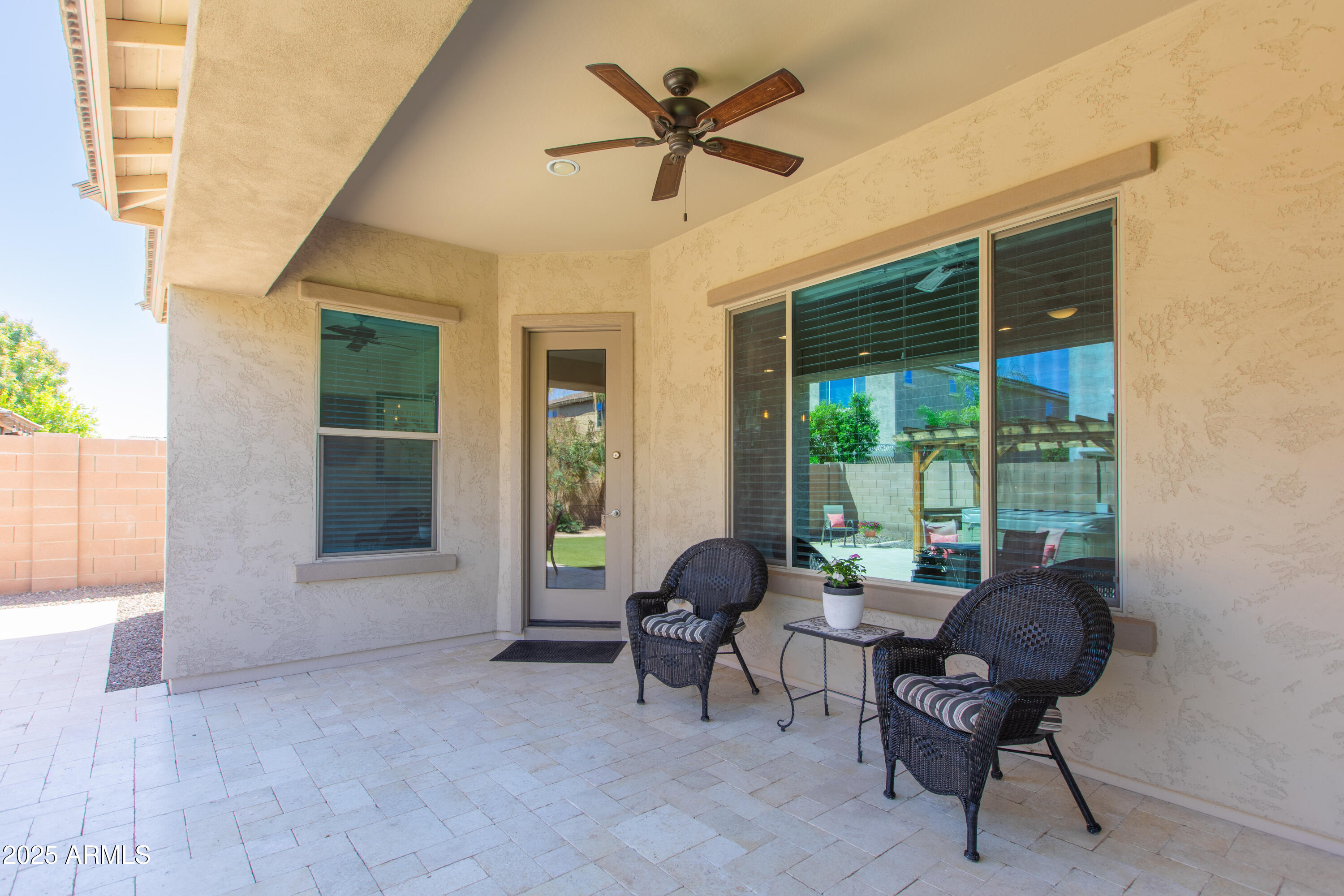 20084 Rosa Road Queen Creek, AZ 85142 - Photo 41 of 53 a living room with furniture and a large window