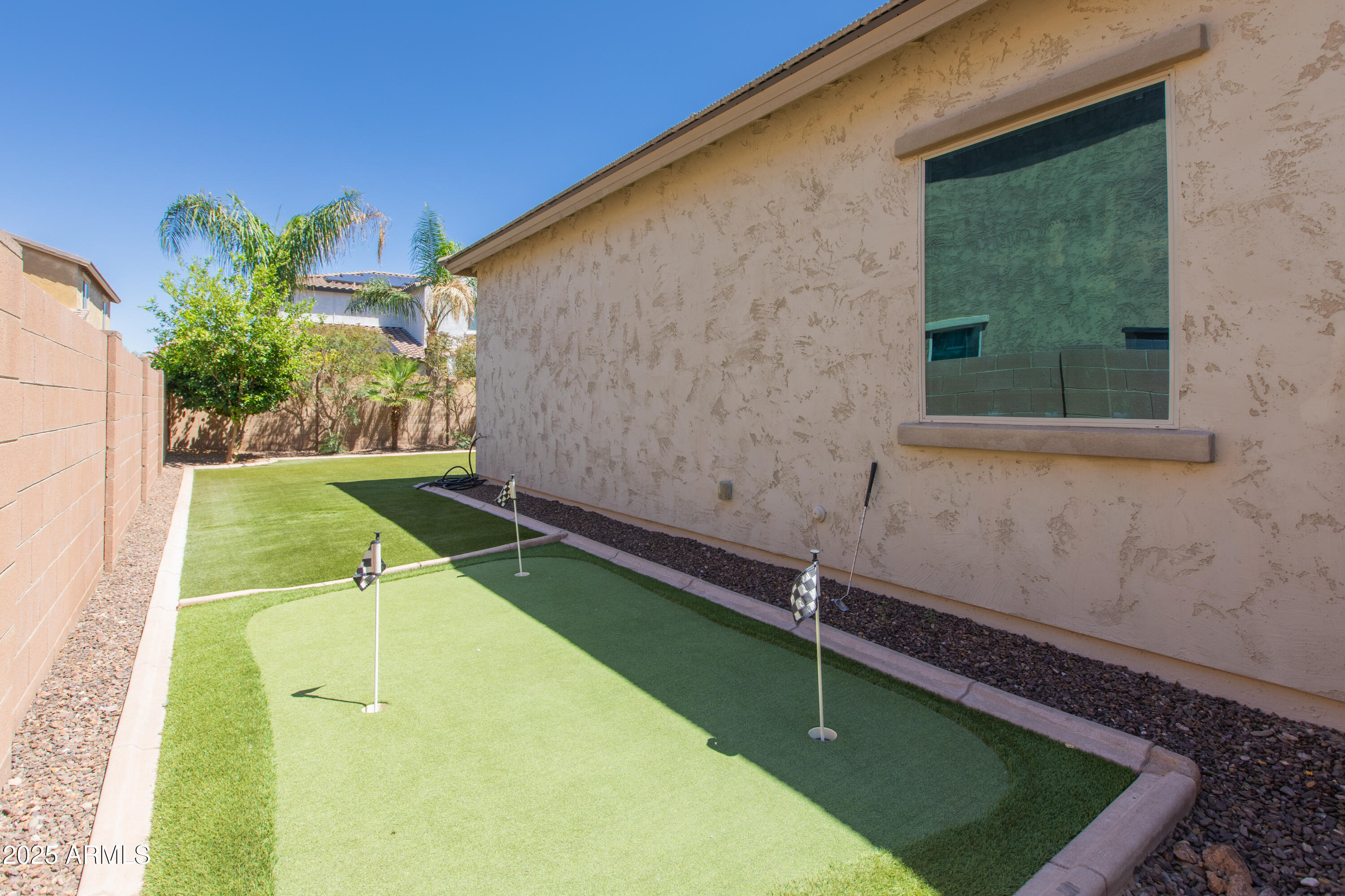 20084 Rosa Road Queen Creek, AZ 85142 - Photo 49 of 53 a view of a backyard with a small pool