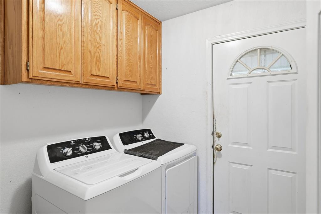 11320 Willow Springs Road Haslet, TX 76052 - Photo 18 of 28 a utility room with dryer and washer