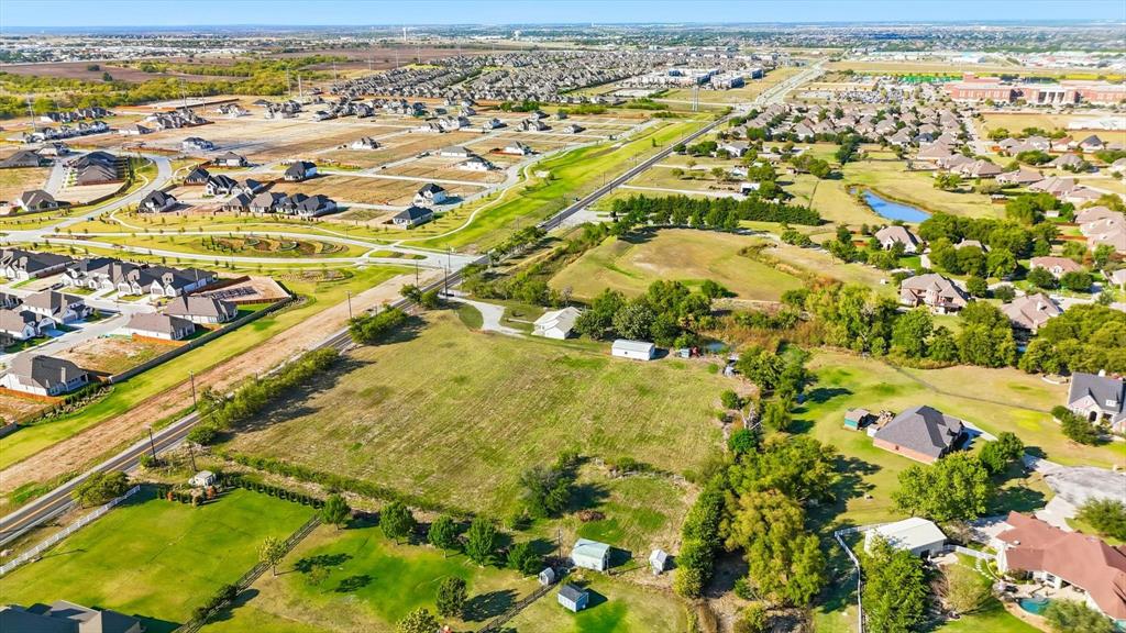 11320 Willow Springs Road Haslet, TX 76052 - Photo 24 of 28 an aerial view of residential houses with outdoor space