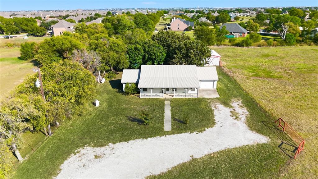 11320 Willow Springs Road Haslet, TX 76052 - Photo 26 of 28 a view of an outdoor space and a yard