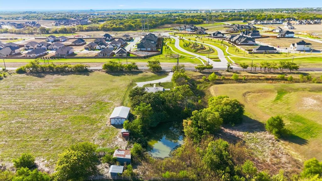 11320 Willow Springs Road Haslet, TX 76052 - Photo 28 of 28 an aerial view of residential houses with outdoor space