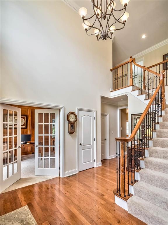 167 Pinkerton Road Wexford, PA 15090 - Photo 2 of 25 Incorporating a stately brick exterior, the design boasts hardwood floors, lofty ceilings and handsome woodwork beginning in the dramatic two story foyer.