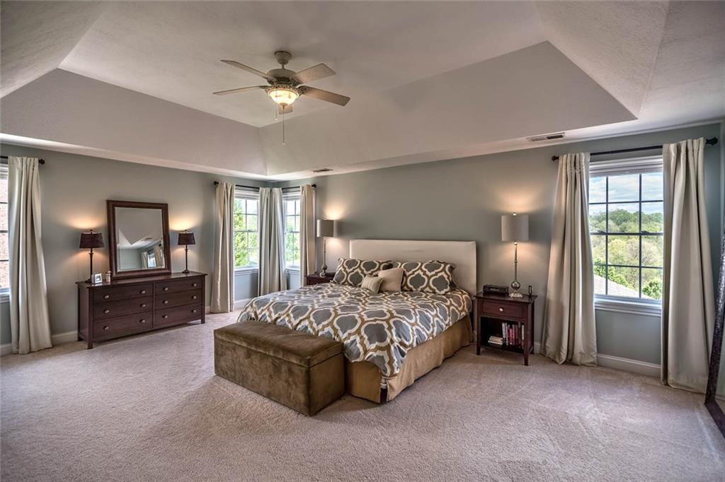 167 Pinkerton Road Wexford, PA 15090 - Photo 13 of 25 The master bedroom is a wonderful retreat, playing host to two walk-in closets, tray ceiling and spa tub.
