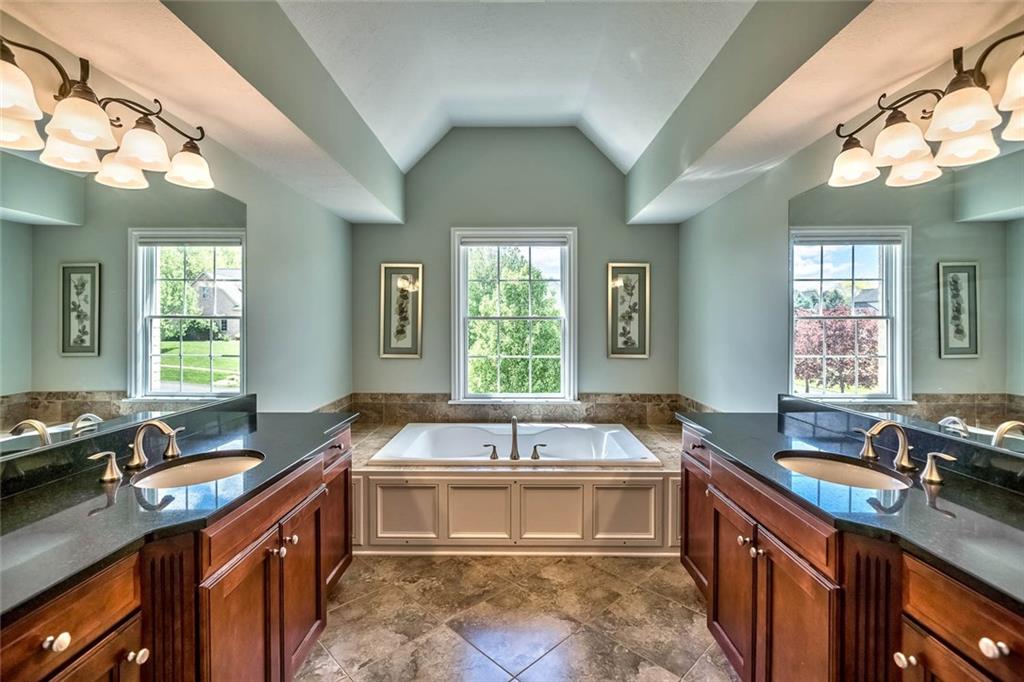 167 Pinkerton Road Wexford, PA 15090 - Photo 14 of 25 No compromise has been made when it comes to luxury in the master bath complete with double sinks, Jacuzzi tub, granite accents and ceramic shower stall.