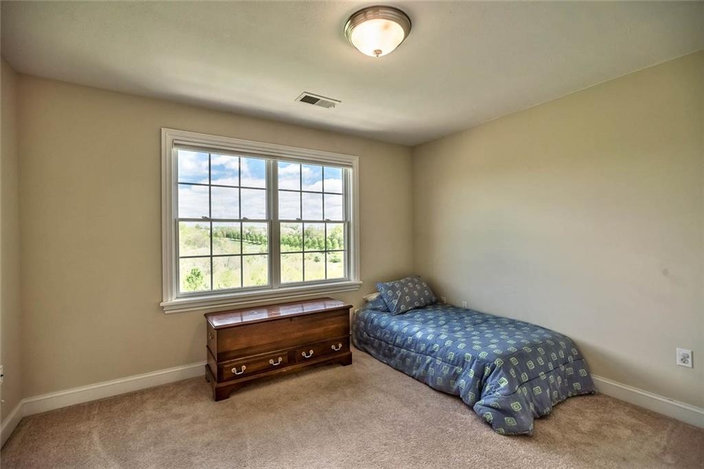 167 Pinkerton Road Wexford, PA 15090 - Photo 18 of 25 The cheerful fourth bedroom benefits from an adjoining private bath.