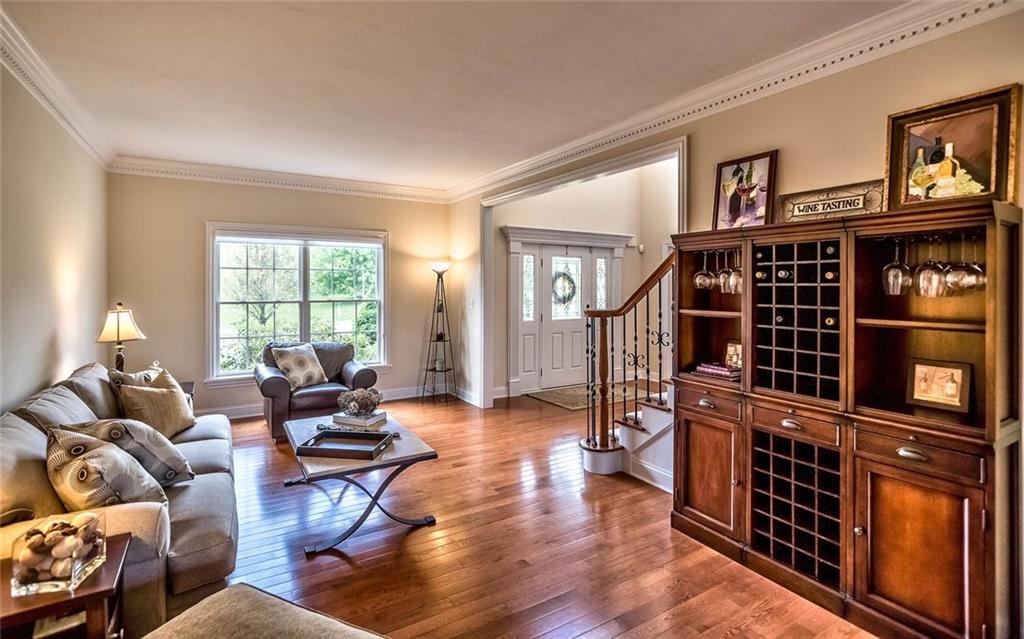 167 Pinkerton Road Wexford, PA 15090 - Photo 3 of 25 The spacious floor plan ensures an easy flow from one room to another, sensibly combining impressive areas for entertaining with private family living areas.