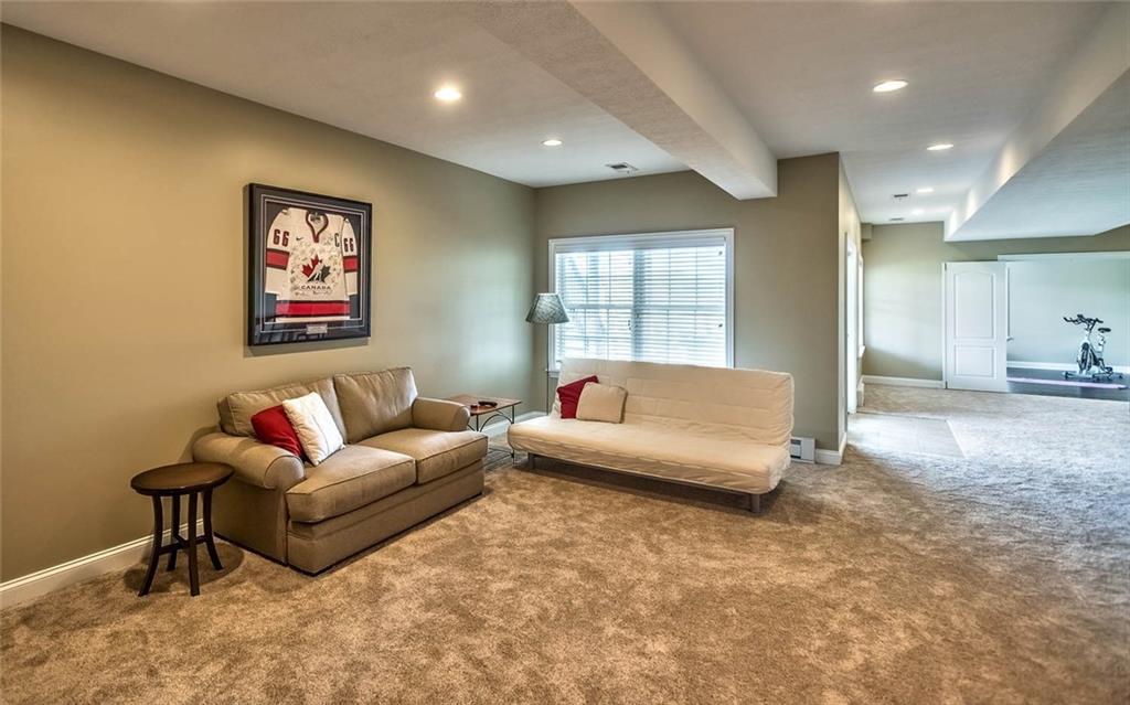 167 Pinkerton Road Wexford, PA 15090 - Photo 21 of 25 A walk-in storage game closet, full bath, new carpeting (2017) and exercise room/bedroom complete the walk-out lower level with plenty of natural light.