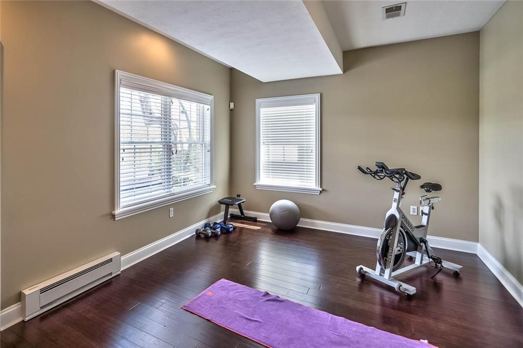 167 Pinkerton Road Wexford, PA 15090 - Photo 22 of 25 Versatile areas on the finished lower level include an expansive game room and exercise/fifth bedroom with bamboo flooring.