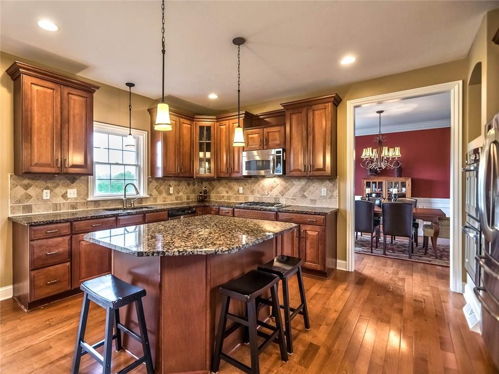 167 Pinkerton Road Wexford, PA 15090 - Photo 5 of 25 The gourmet kitchen offers fine finishes including granite, marble and stainless.