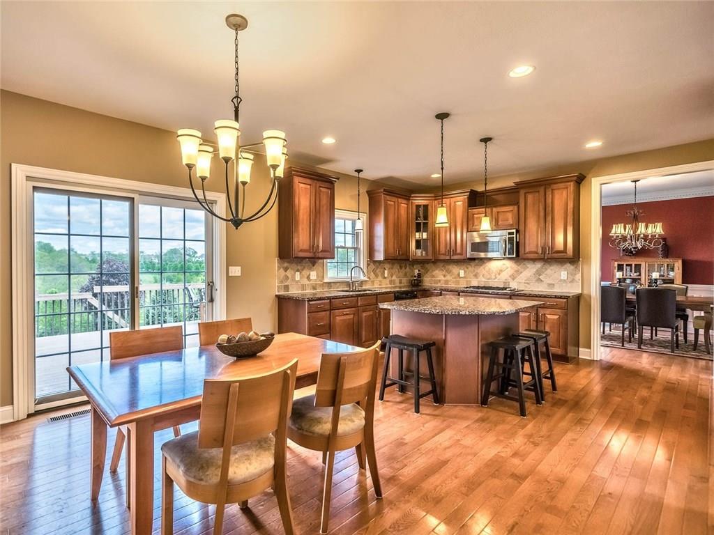 167 Pinkerton Road Wexford, PA 15090 - Photo 6 of 25 The expansive kitchen with breakfast area and deck access offers indoor and outdoor dining options.