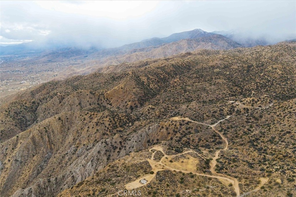 0 San Jacinto Road Pioneertown, CA 92268 - Photo 6 of 30 a view of a dry yard with mountains in the background