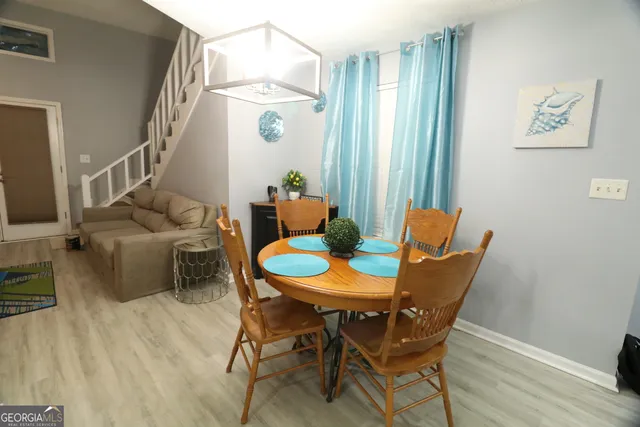 a living room with furniture and a table