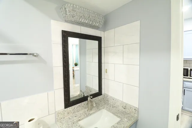 a bathroom with a sink and a toilet