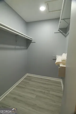 a view of a room with racks on the wall