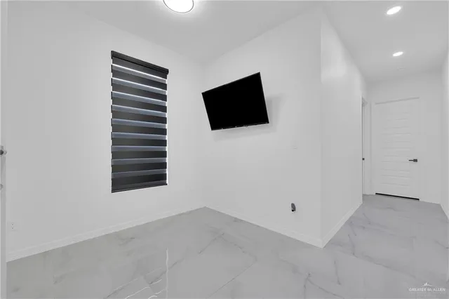 a view of a livingroom with a flat screen tv