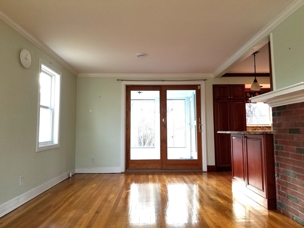 225 Governors Road, Unit 225 Quincy, MA 02169 - Photo 3 of 19 a view of an empty room with a window