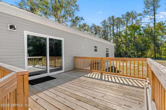 a view of deck with a patio