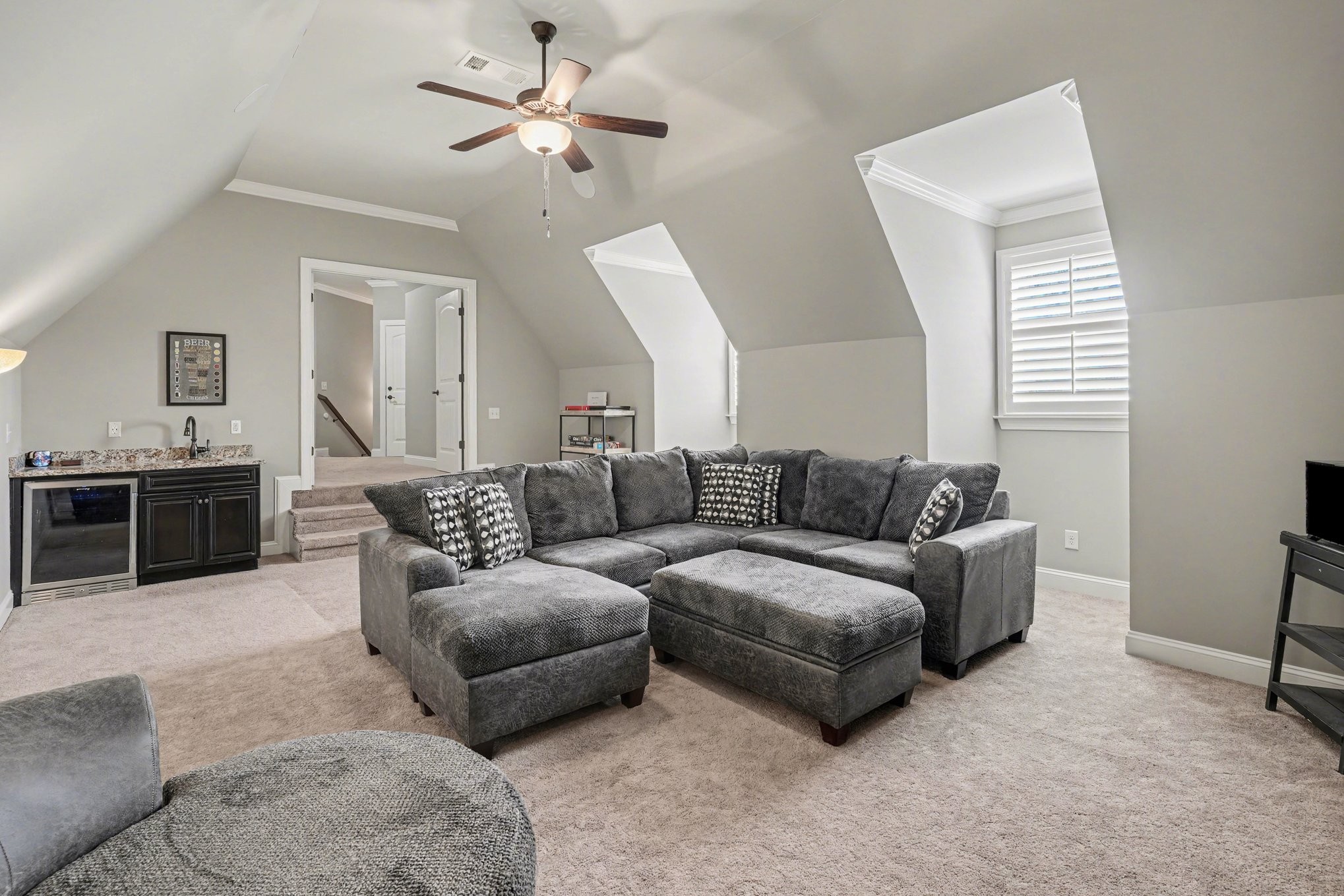 5094 Moss Road Nashville, TN 37221 - Photo 16 of 29 a living room with furniture and a chandelier