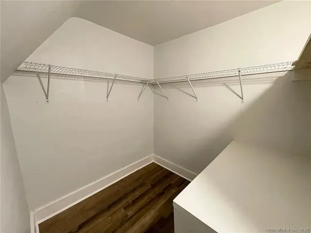 a view of a room with racks on the wall