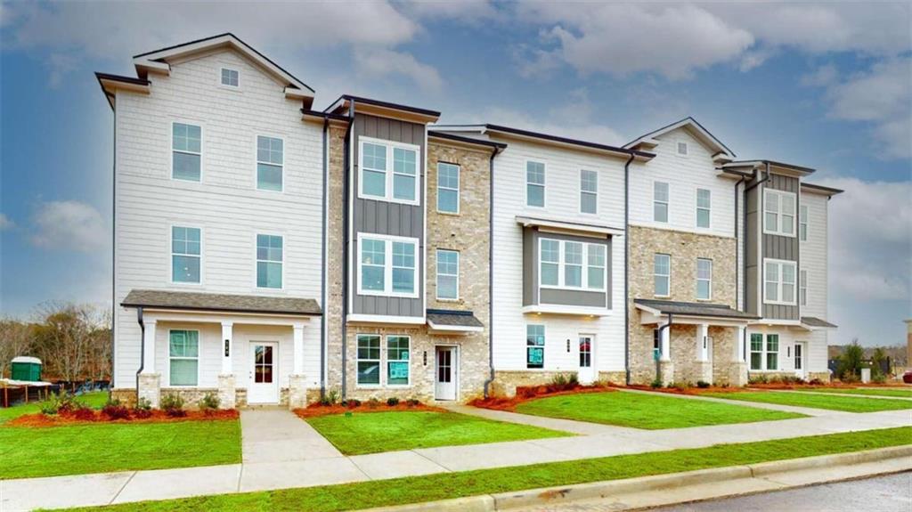 140 Reese Street Fayetteville, GA 30214 - Photo 1 of 1 a front view of a building with a yard