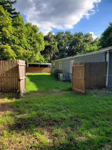 a view of a backyard with a garden