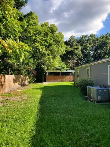 a view of a backyard with a garden